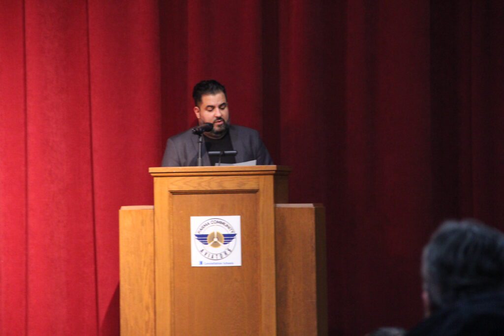 Administration and Staff address the National Honor Society Inductees at Parma Community at NHS ceremony