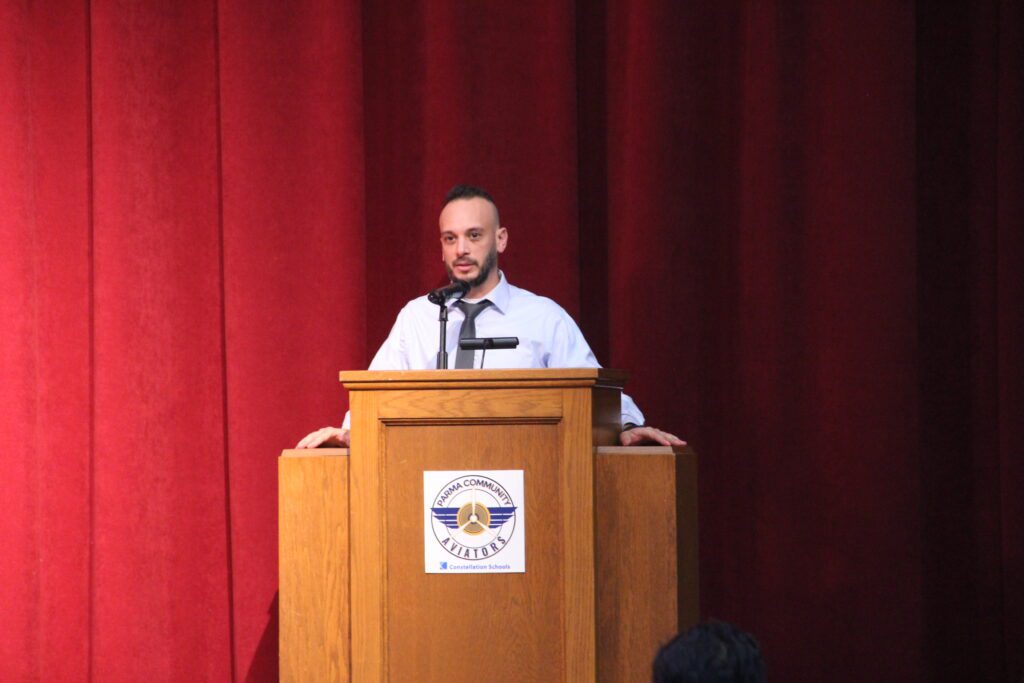 Administration and Staff address the National Honor Society Inductees at Parma Community at NHS ceremony